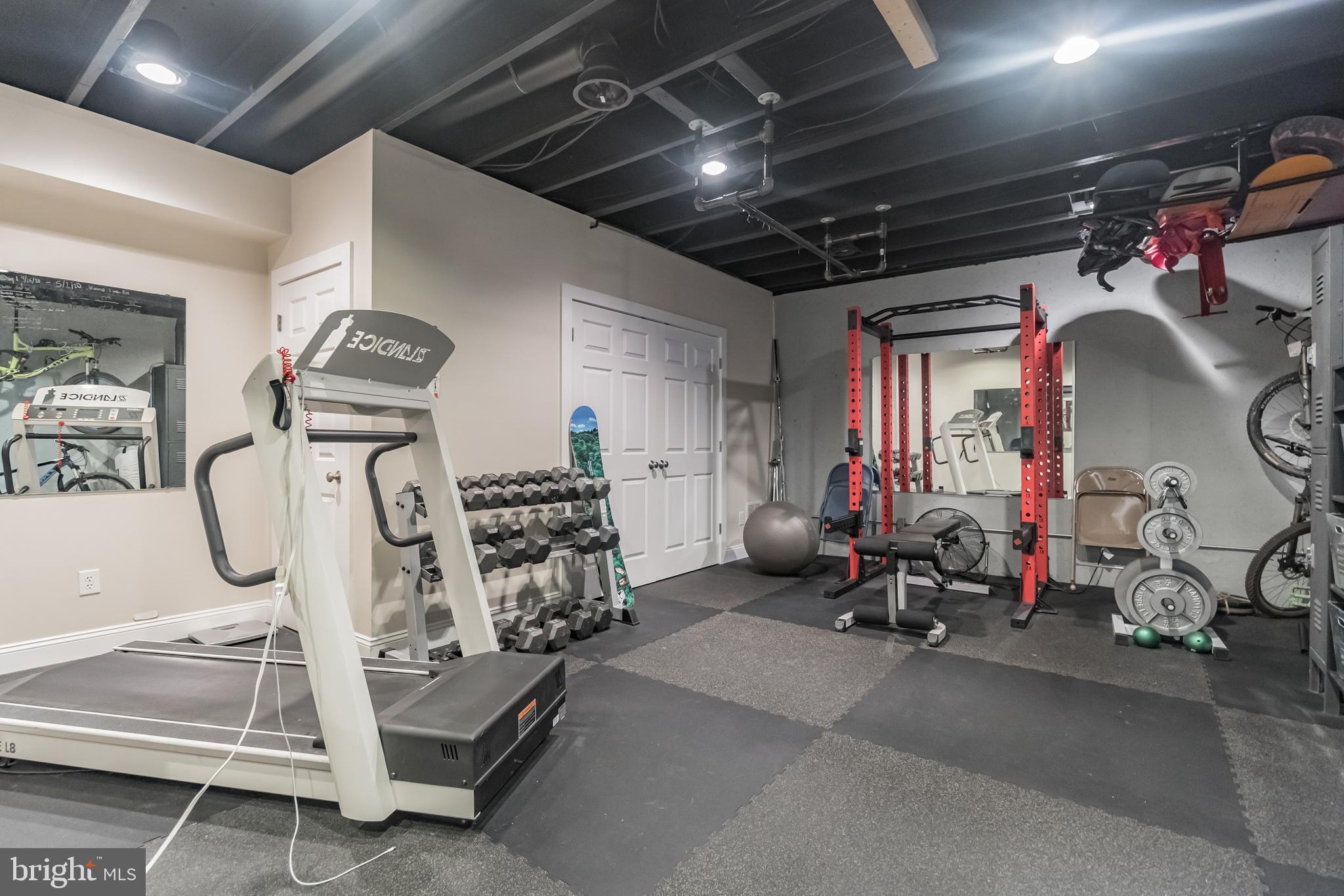 8291 Roxborough Loop Gainesville, VA 20155 - Photo 31 of 39 Work out room w/ commercial grade rubber flooring