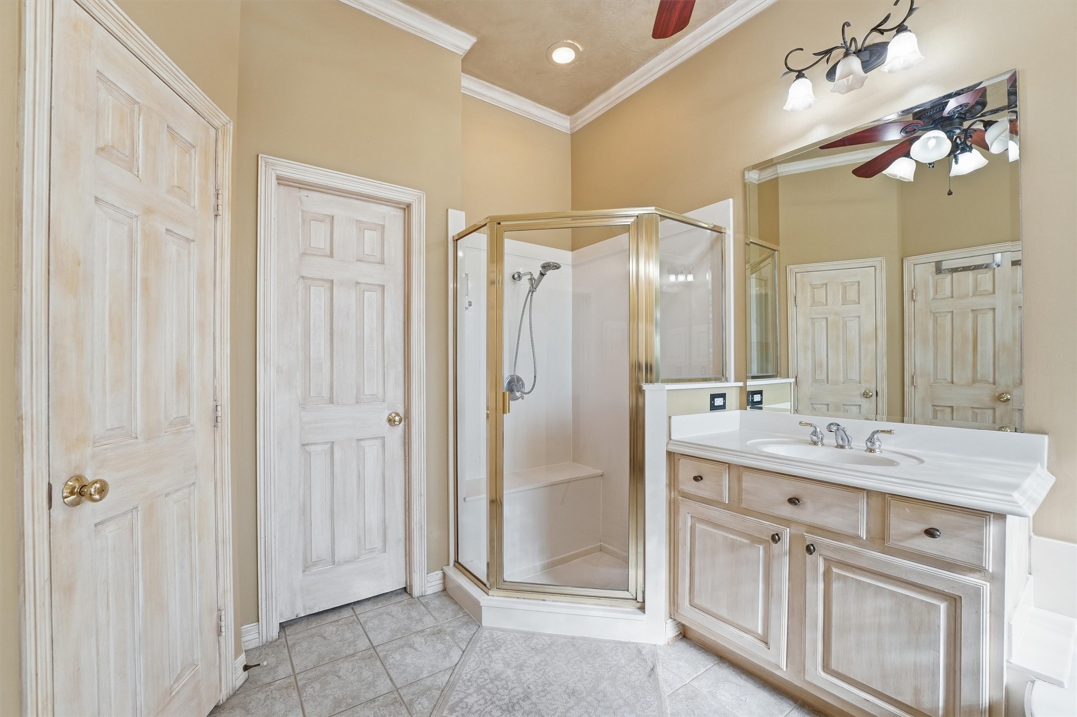 7303 Texas Laurel Loop Humble, TX 77346 - Photo 22 of 32 a bathroom with a double vanity sink mirror and double