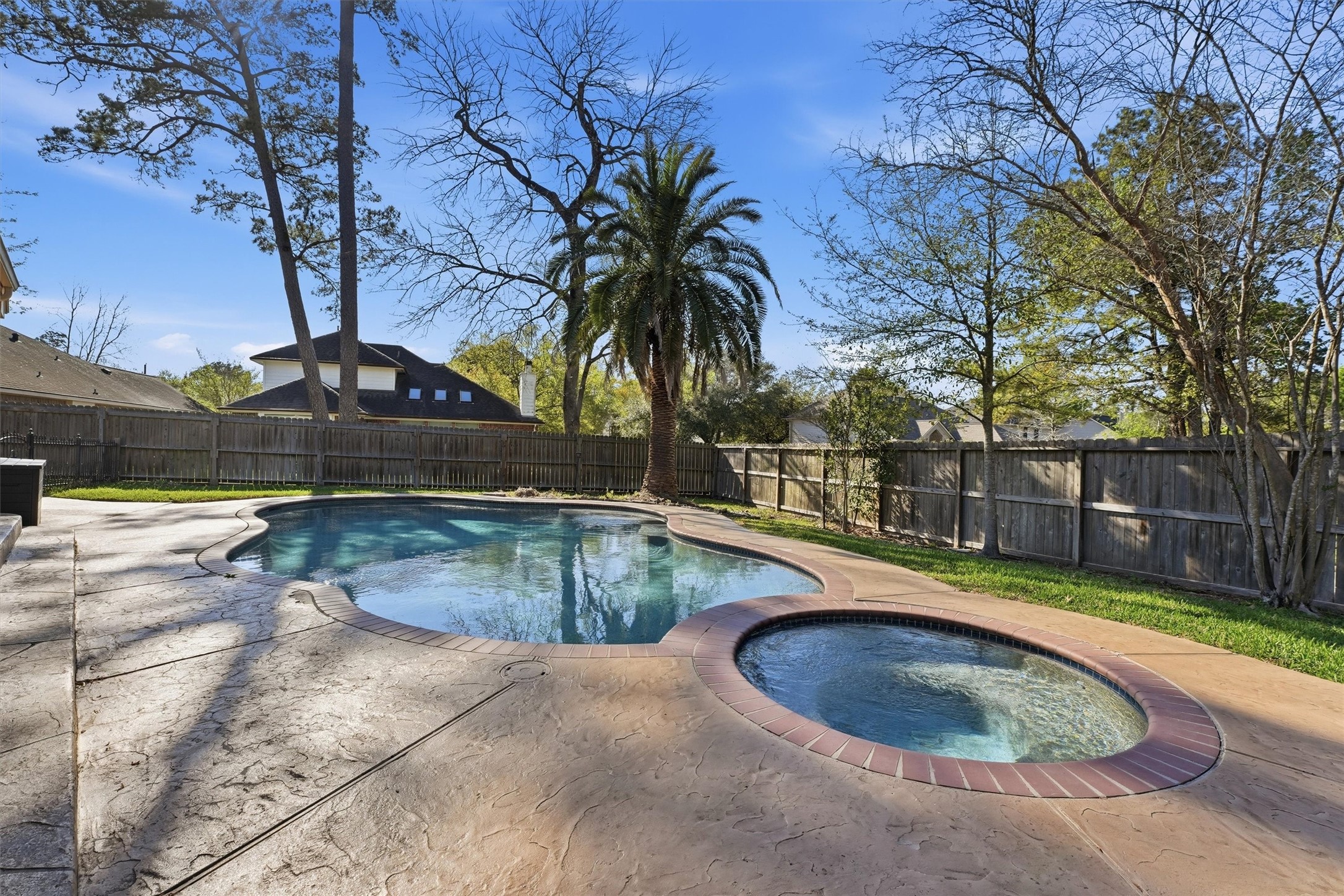 7303 Texas Laurel Loop Humble, TX 77346 - Photo 25 of 32 a view of outdoor space and swimming pool