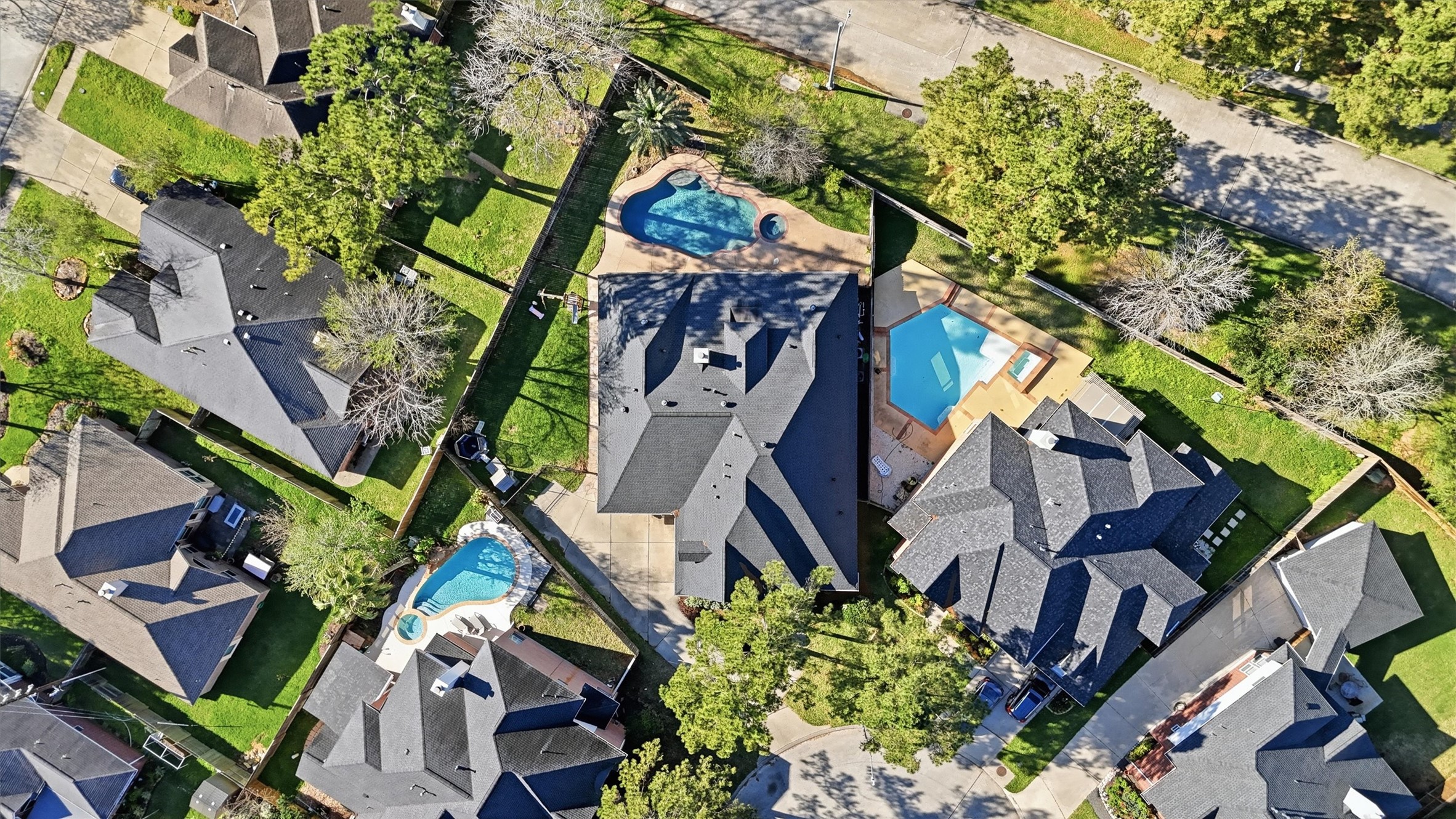 7303 Texas Laurel Loop Humble, TX 77346 - Photo 29 of 32 an aerial view of a house with a yard and potted plants