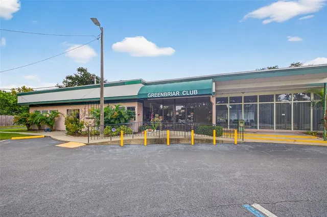 a view of a playground with basketball court