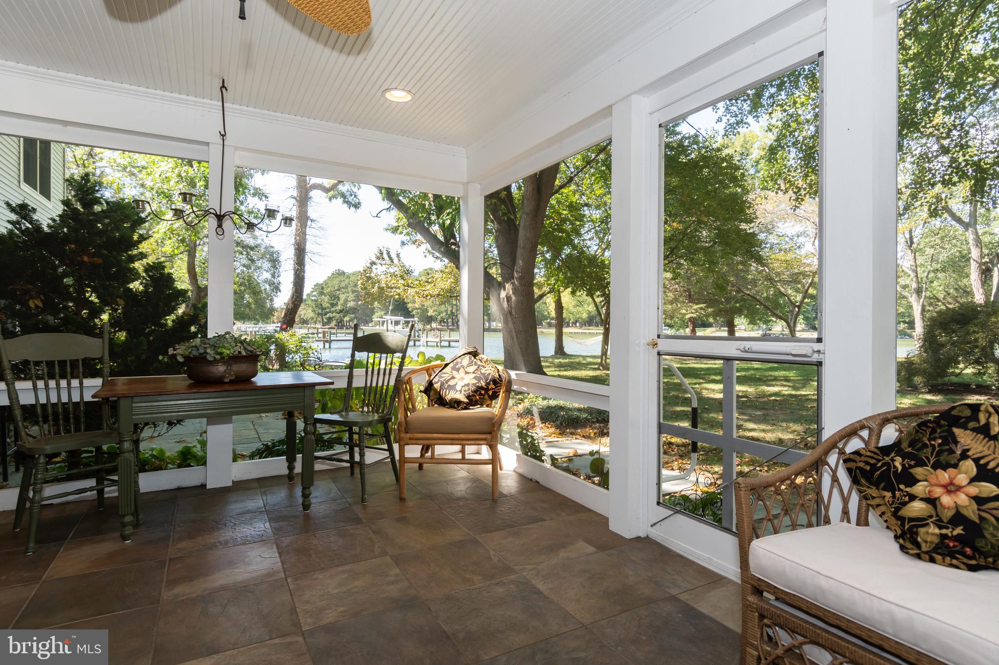 6786 Edge Road Royal Oak, MD 21662 - Photo 18 of 65 Screened porch with wrap around views.
