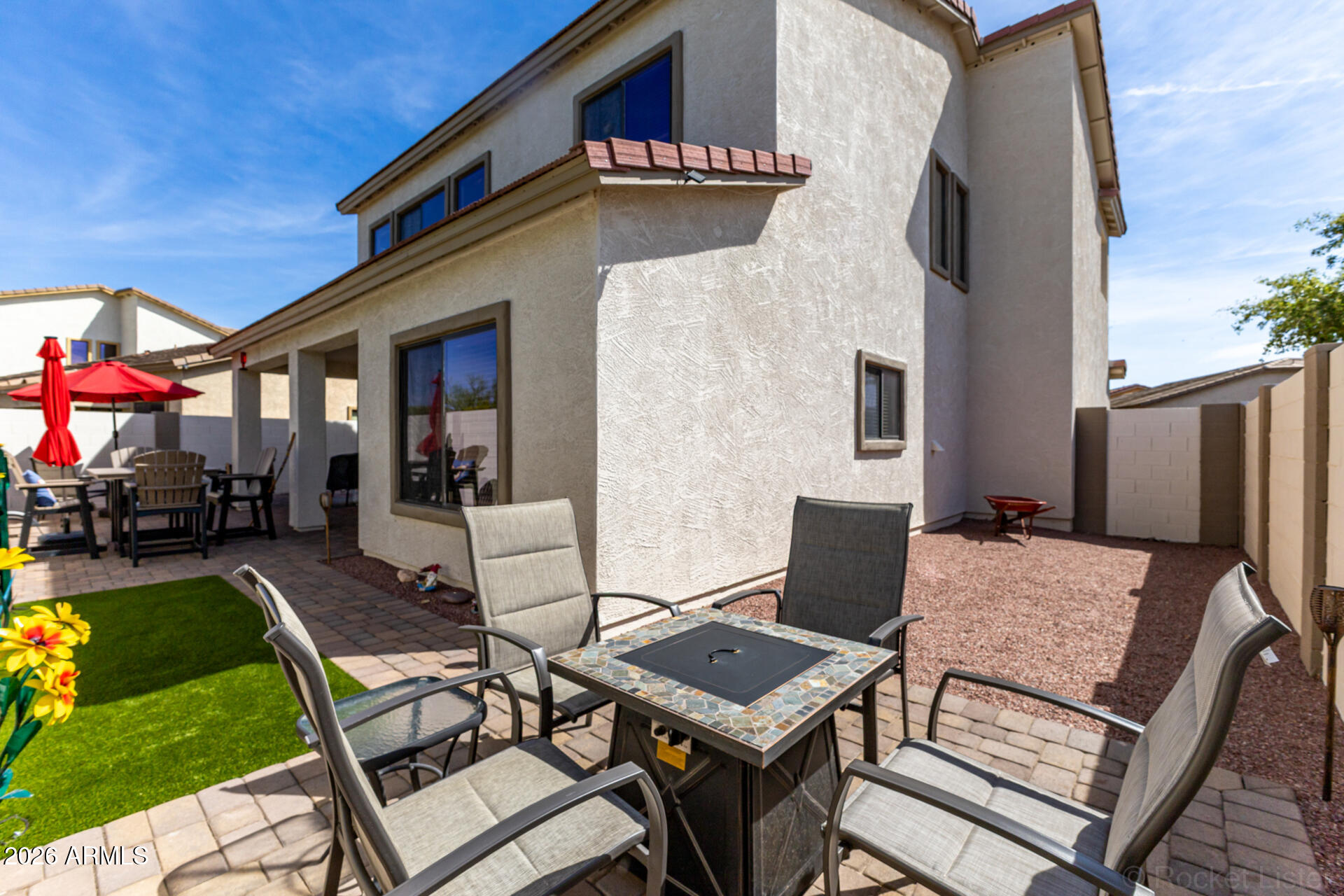 2756 South Powell Road Apache Junction, AZ 85119 - Photo 27 of 37 a view of a dinning tables and chairs in a patio