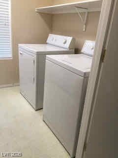 2115 Hidden Ranch Terrace Henderson, NV 89052 - Photo 23 of 30 Laundry room featuring washing machine and clothes dryer
