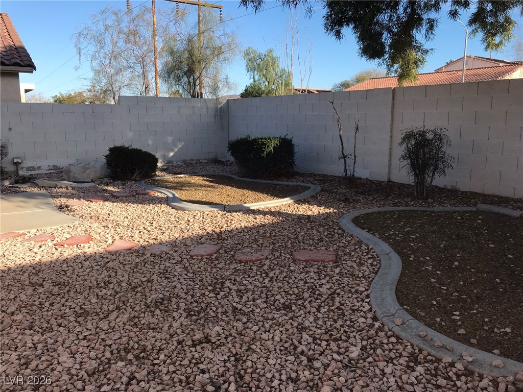 2115 Hidden Ranch Terrace Henderson, NV 89052 - Photo 25 of 30 View of fenced backyard