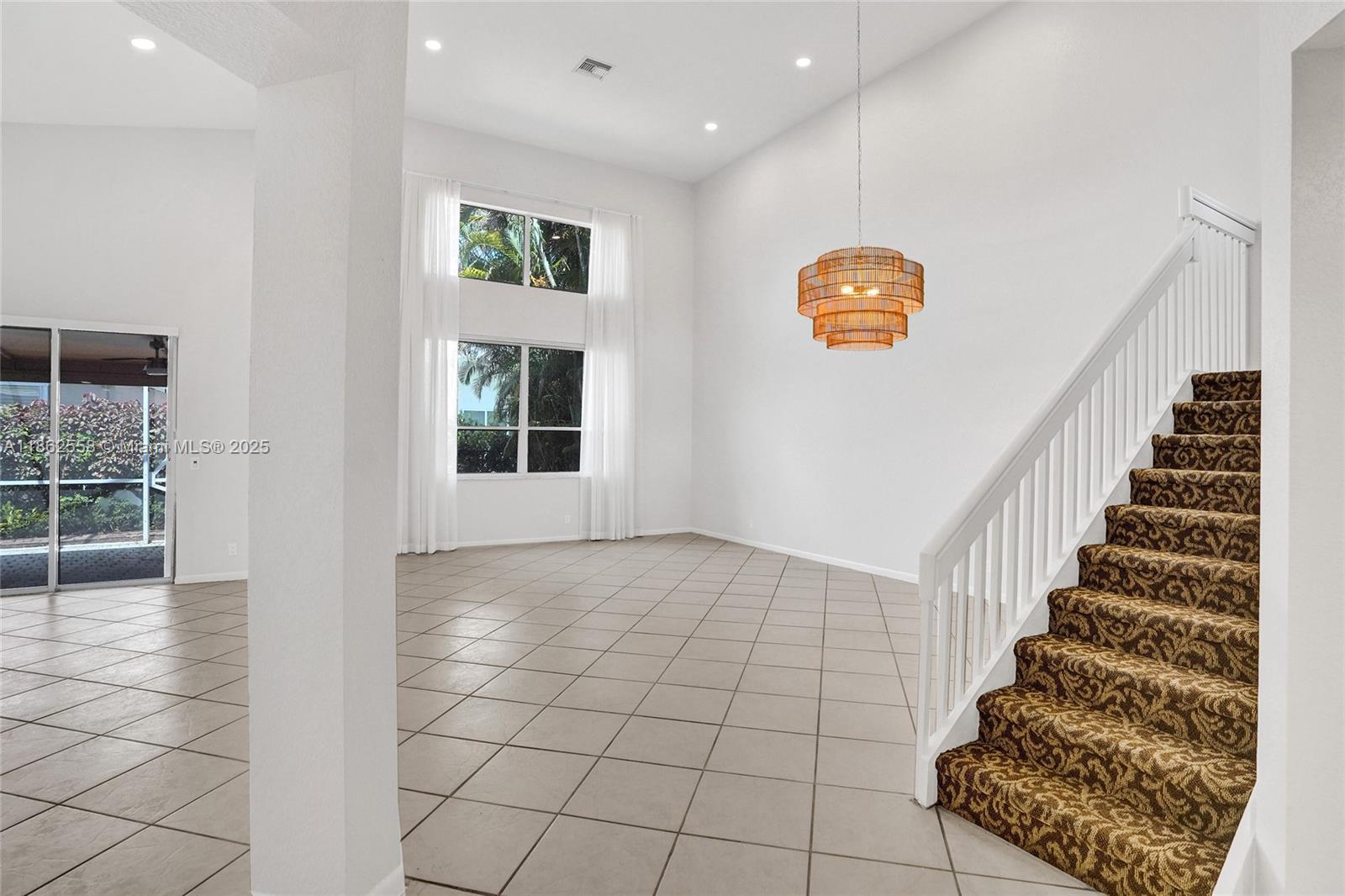 6450 Brava Way Boca Raton, FL 33433 - Photo 20 of 80 a view of an entryway with stairs