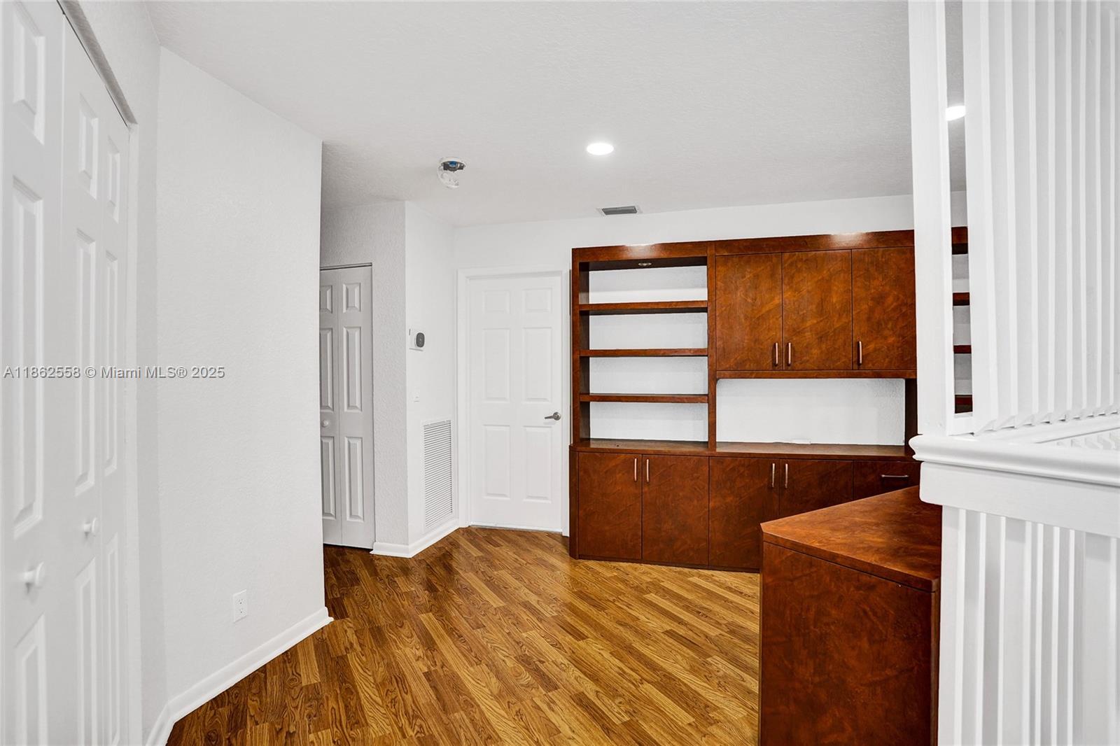 6450 Brava Way Boca Raton, FL 33433 - Photo 44 of 80 a bedroom with a bed and a window