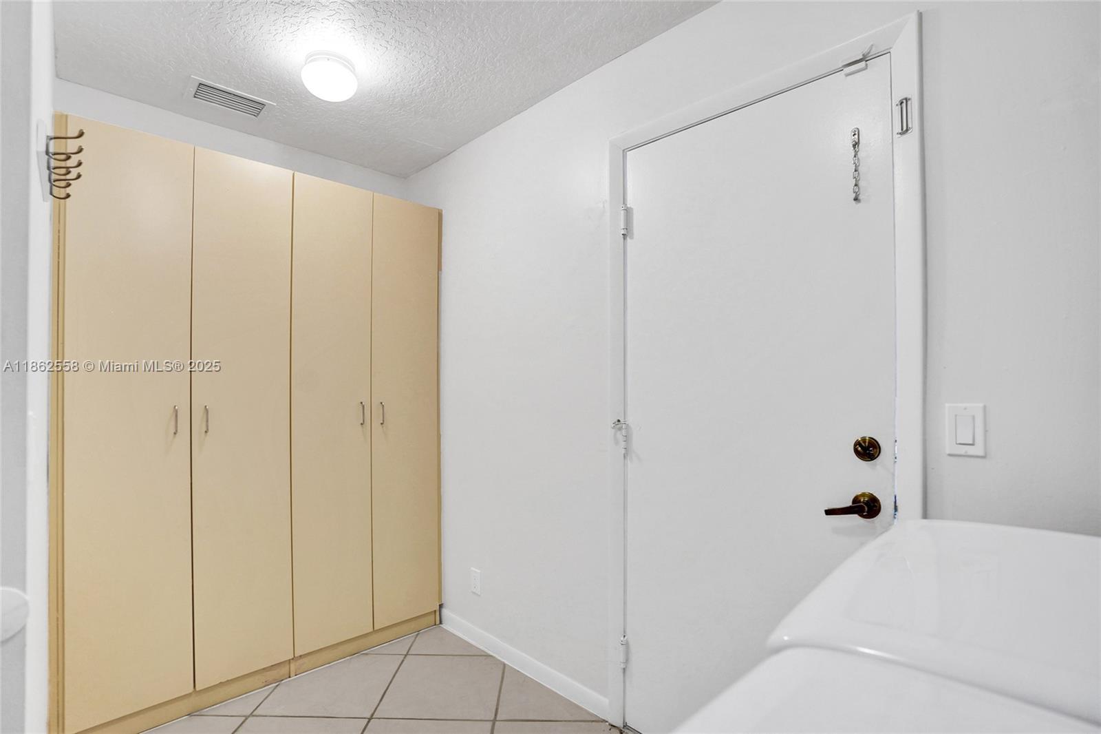 6450 Brava Way Boca Raton, FL 33433 - Photo 67 of 80 a room with a bed and a shower