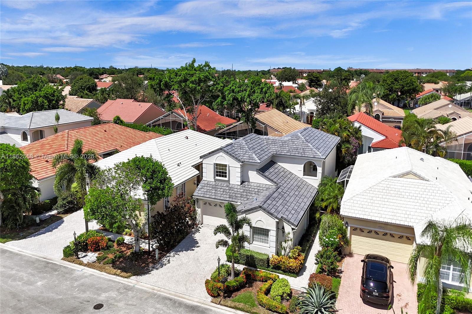 6450 Brava Way Boca Raton, FL 33433 - Photo 75 of 80 an aerial view of residential houses with outdoor space and street view