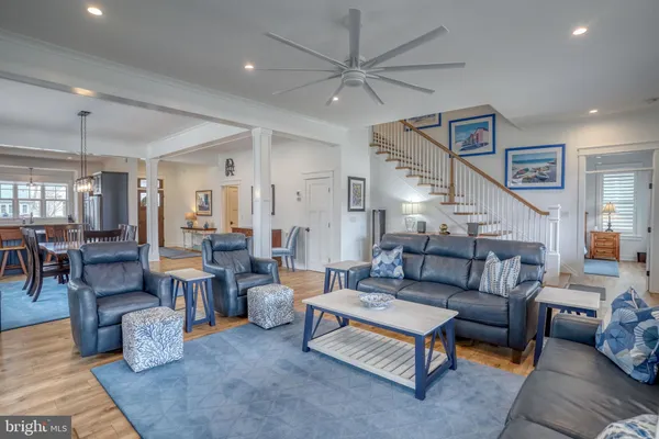a front view of house with yard and outdoor seating