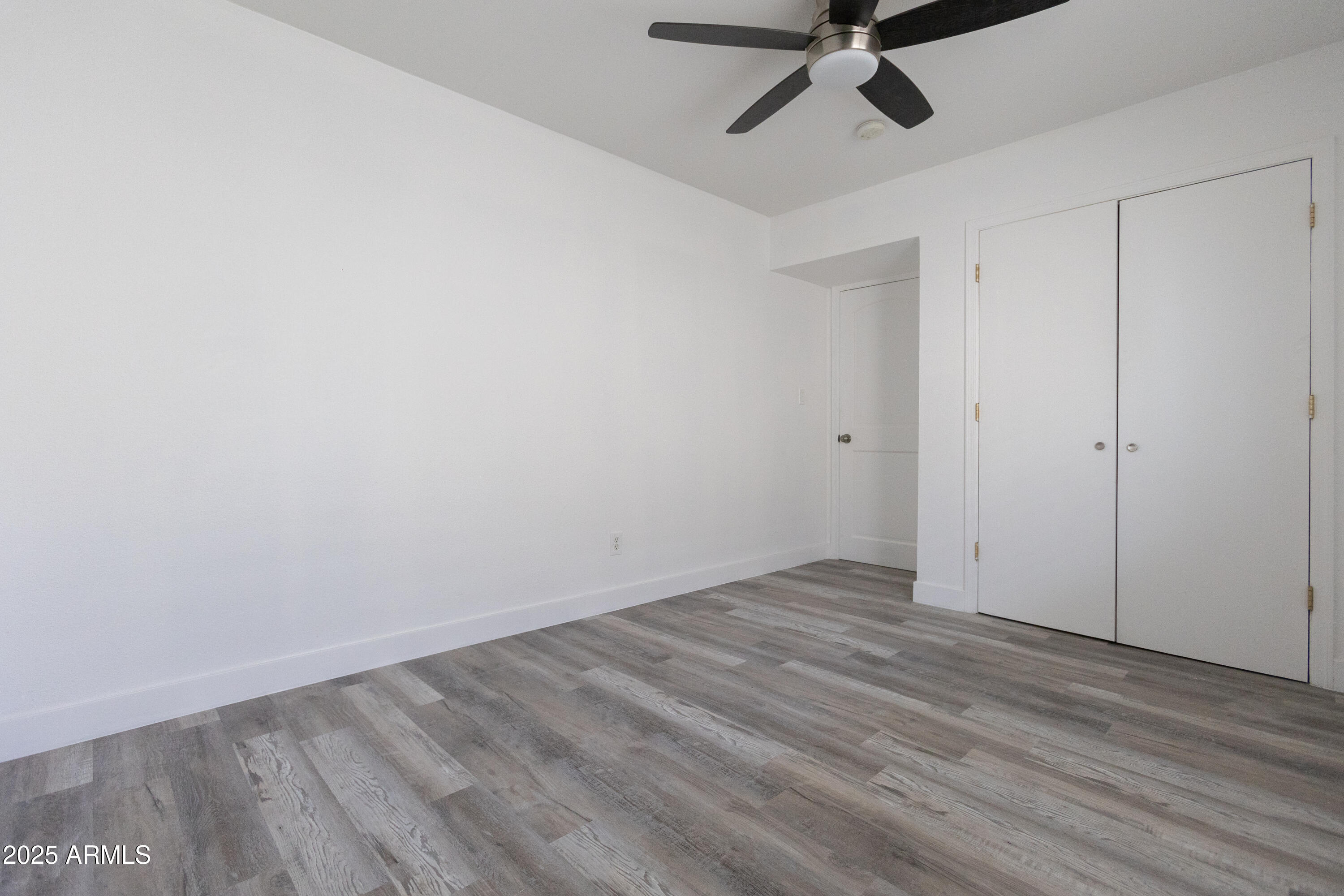 3417 East Windsor Avenue, Unit 2 Phoenix, AZ 85008 - Photo 12 of 12 a view of an empty room