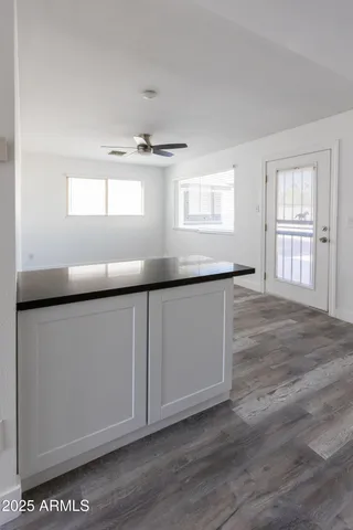 a view of an empty room with a window