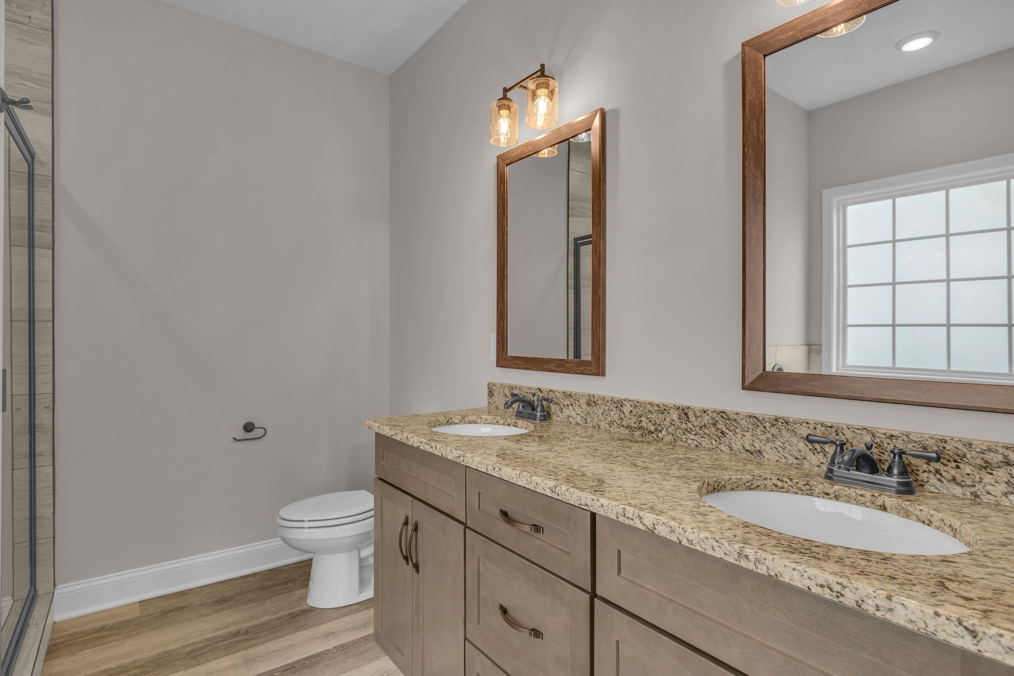 150 Cherry Fields Clarksville, TN 37042 - Photo 11 of 30 a bathroom with a granite countertop sink and a mirror