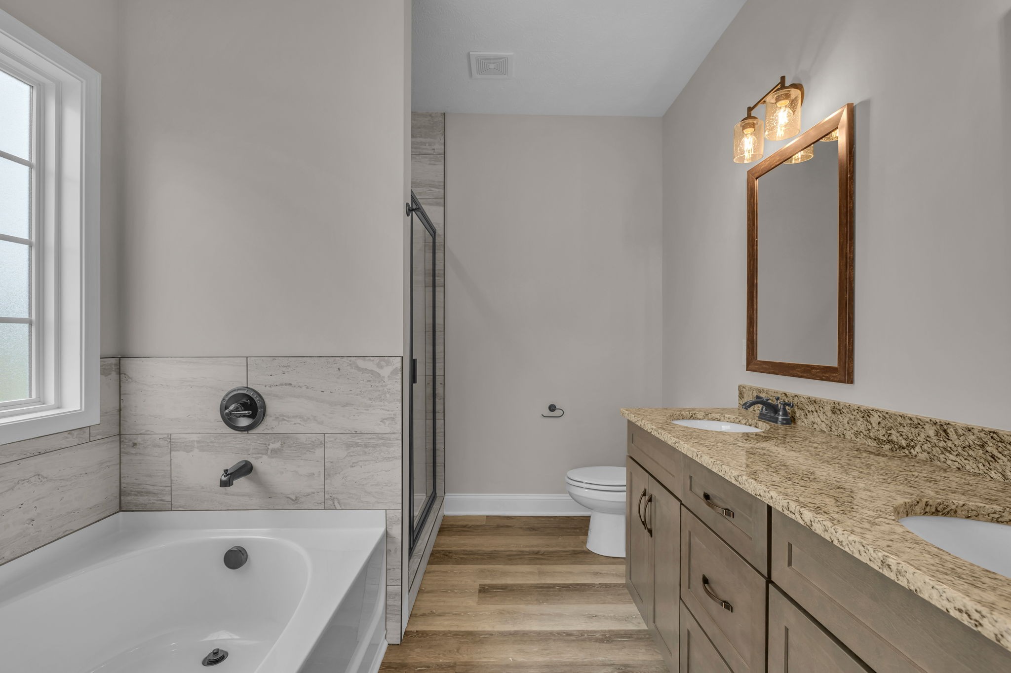 150 Cherry Fields Clarksville, TN 37042 - Photo 12 of 30 a bathroom with a granite countertop tub sink and mirror