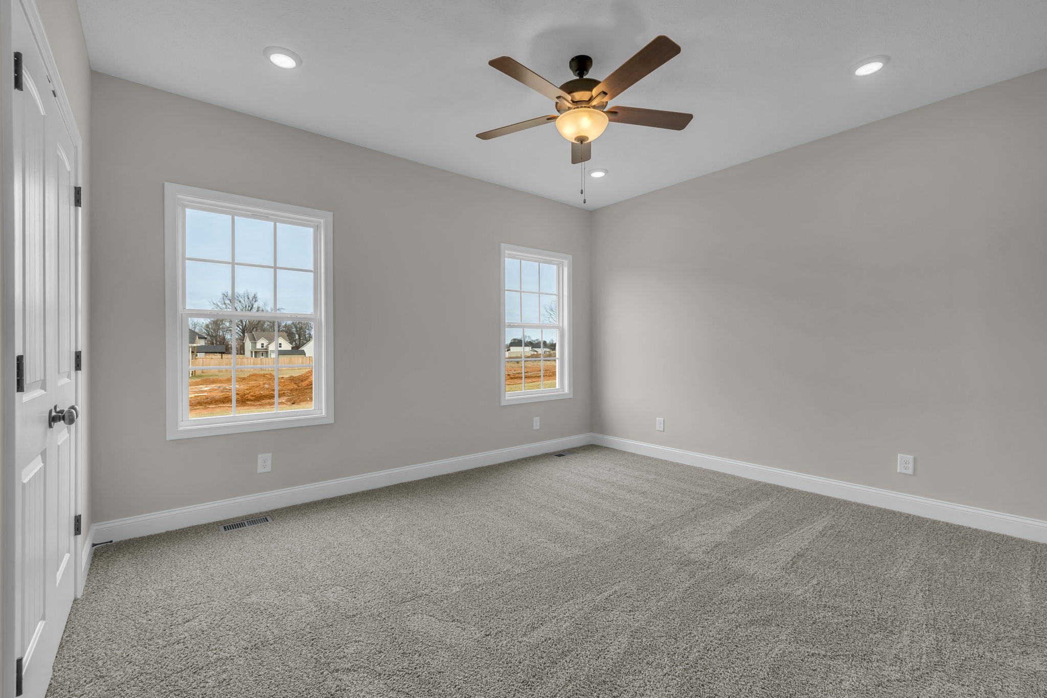 150 Cherry Fields Clarksville, TN 37042 - Photo 15 of 30 an empty room with windows and ceiling fan