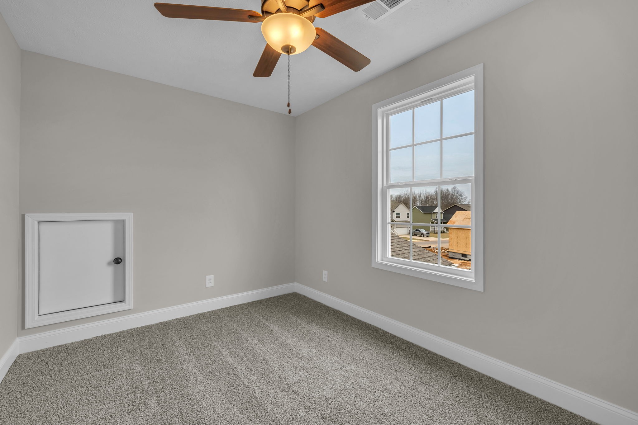 150 Cherry Fields Clarksville, TN 37042 - Photo 20 of 30 an empty room with windows and fan