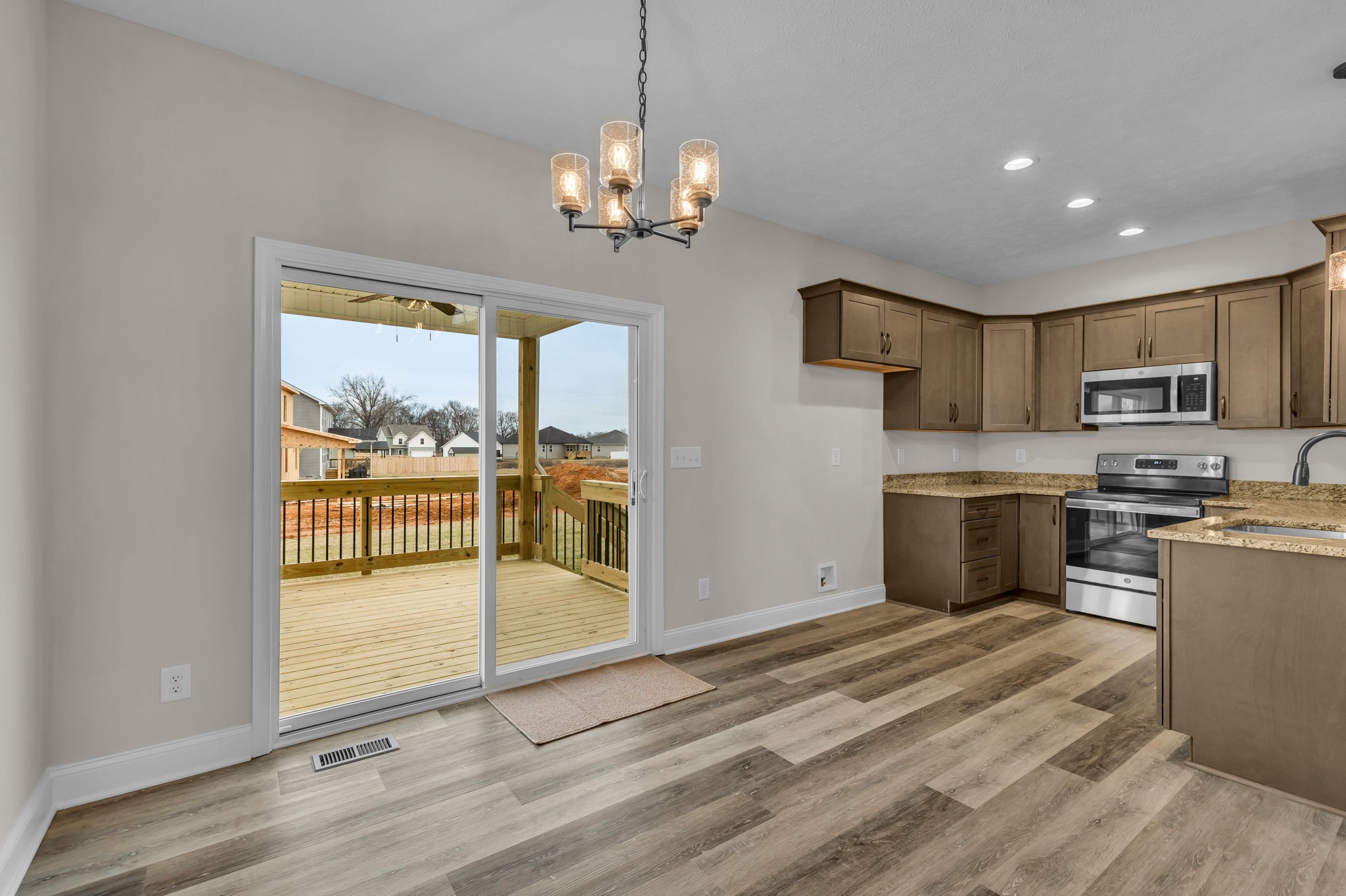 150 Cherry Fields Clarksville, TN 37042 - Photo 7 of 30 a view of a kitchen with a sink and microwave