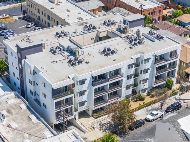 a large building with a parking space