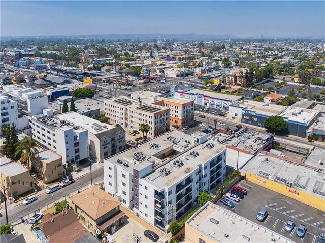 an aerial view of a city with lots of residential buildings