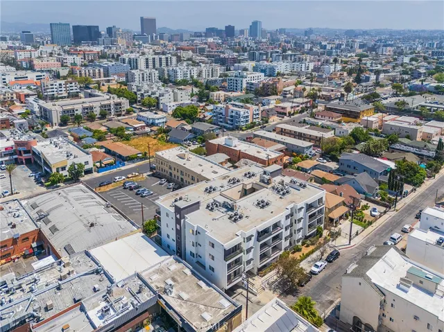 an aerial view of a city with lots of residential buildings