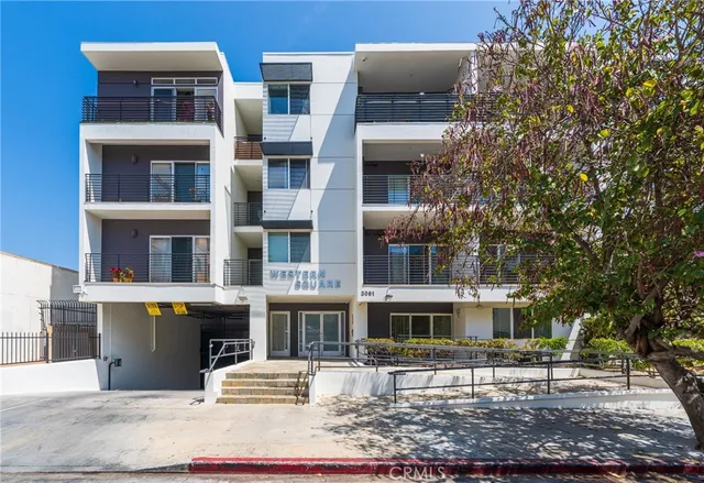a front view of a building with street view