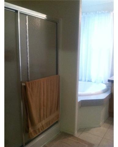 1638 Calavo Road, Unit 2 Fallbrook, CA 92028 - Photo 8 of 13 Spa and shower in master bathroom