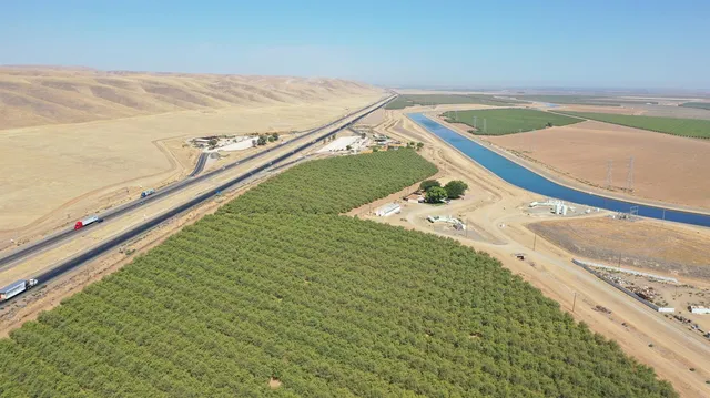 a view of a swimming pool and an outdoor space