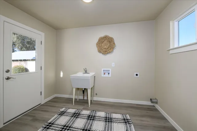 a view of a room with a table and a window
