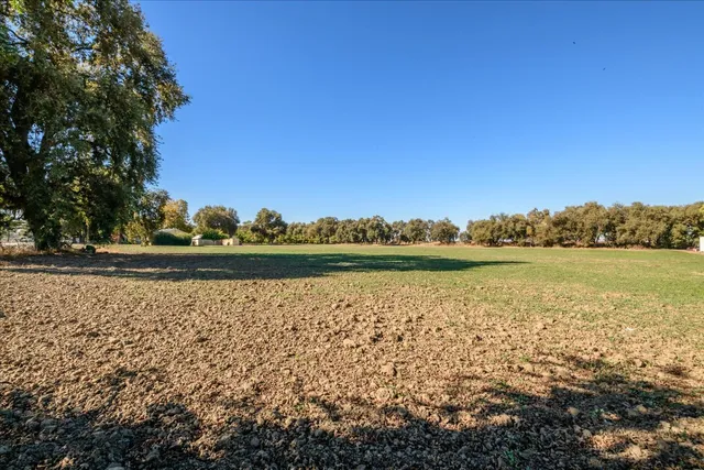 a view of lake with green space
