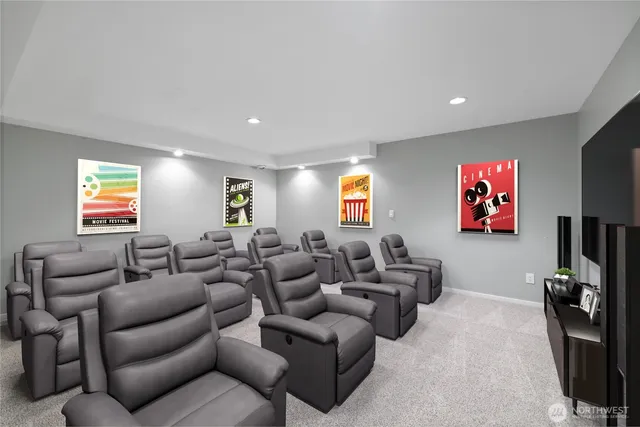 a living room with furniture a projector and a flat screen tv