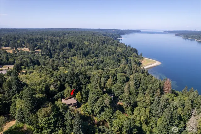 a view of a houses with a lake and mountain view