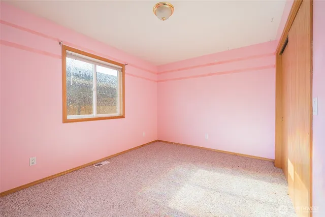 an empty room with a window