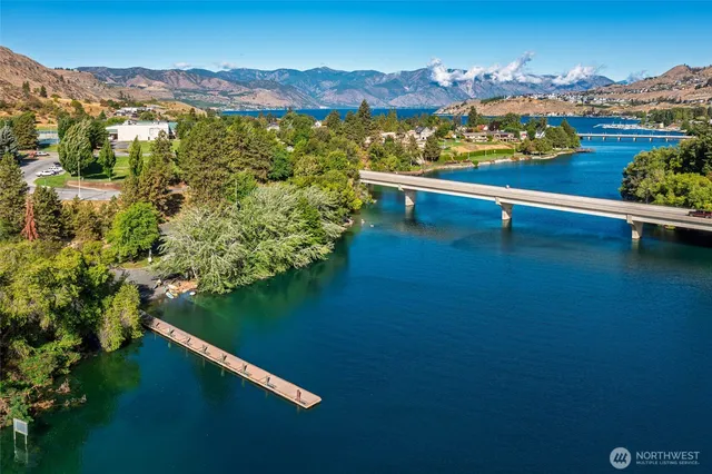 a view of a city with a lake