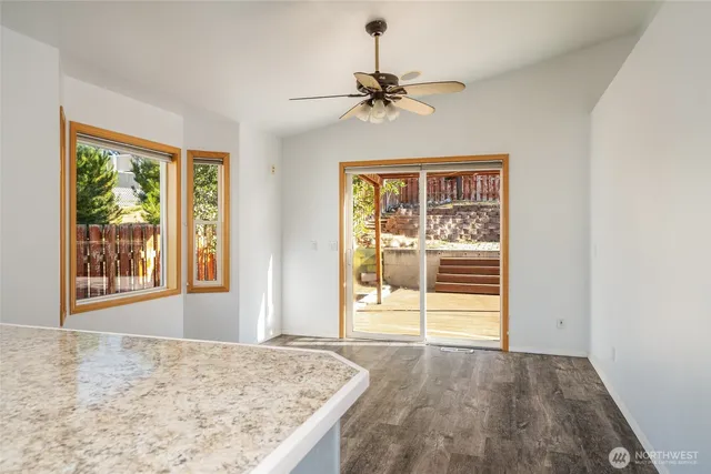 a view of a bedroom with a balcony
