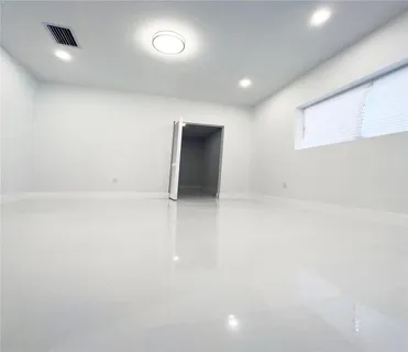 an empty room with windows