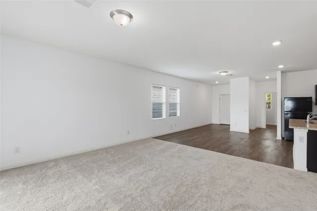 a view of kitchen with microwave and stove
