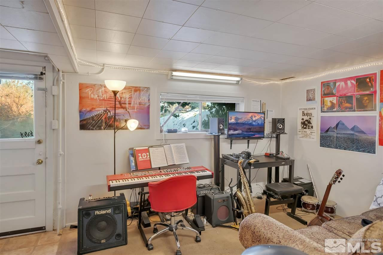 1135 The Strand Reno, NV 89503 - Photo 23 of 33 a view of a workspace with furniture and a window
