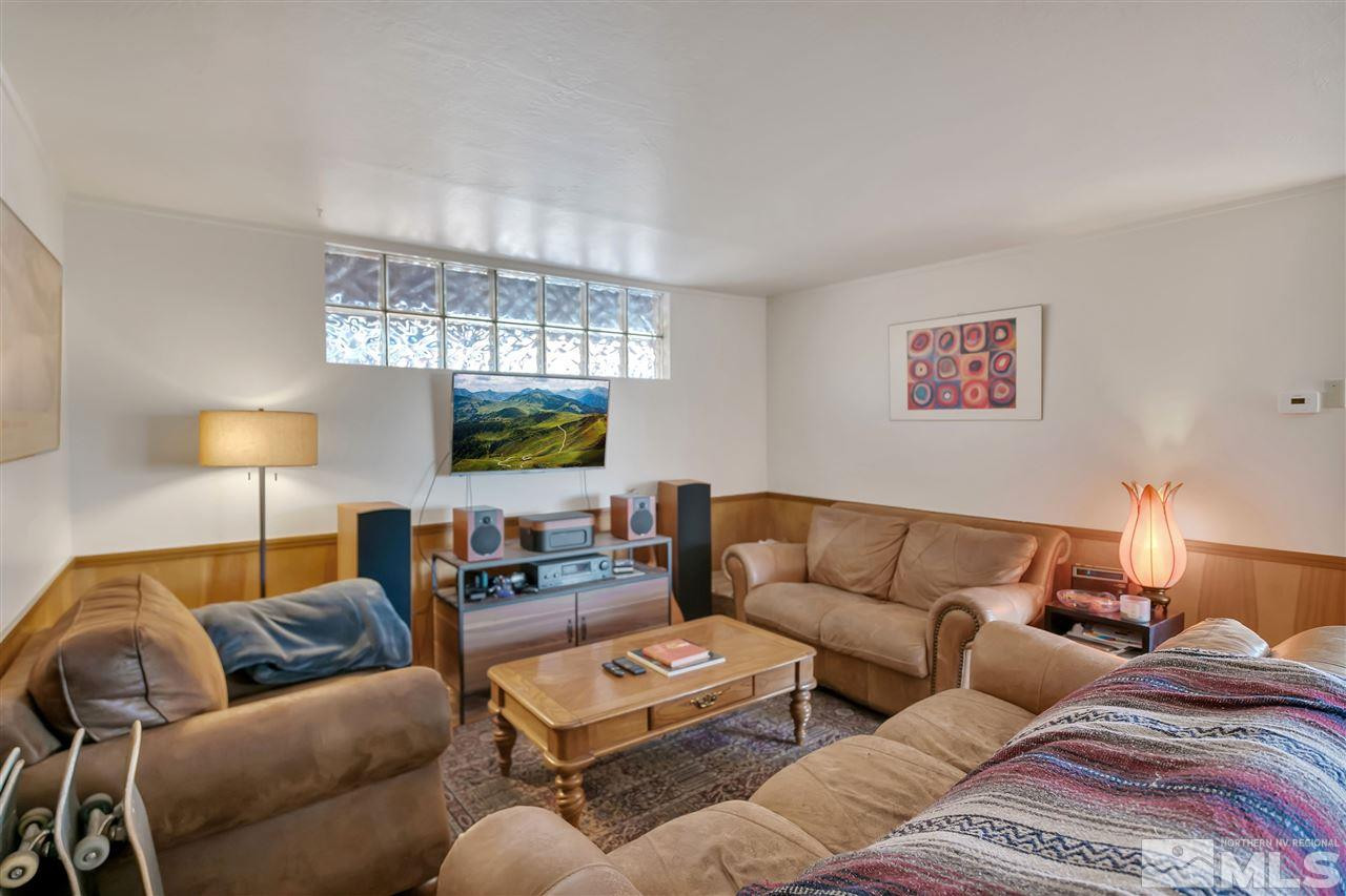 1135 The Strand Reno, NV 89503 - Photo 7 of 33 a living room with furniture and a large window