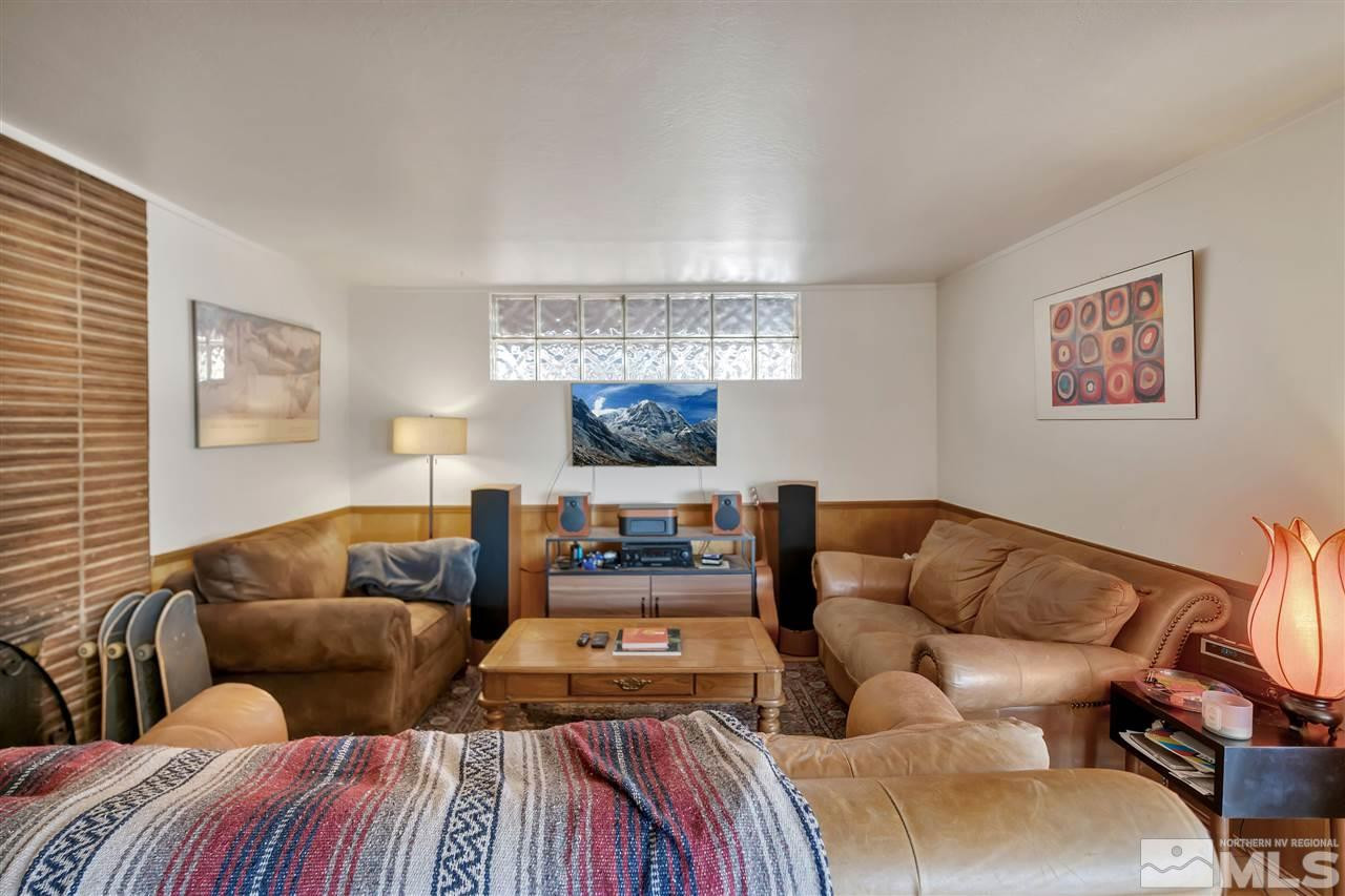 1135 The Strand Reno, NV 89503 - Photo 9 of 33 a living room with furniture and a couch