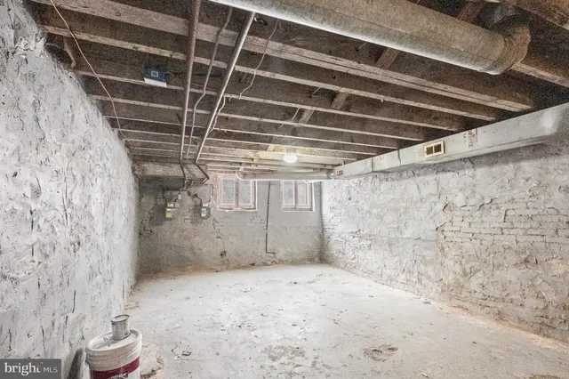 a view of a room with wooden walls