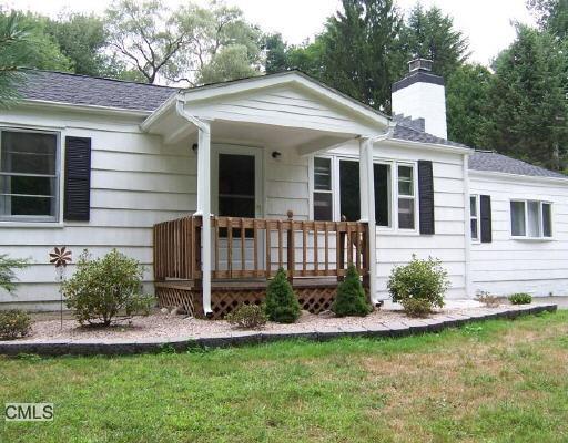 301 Hattertown Road Monroe, CT 06468 - Photo 1 of 1 a view of a house with a yard and plants