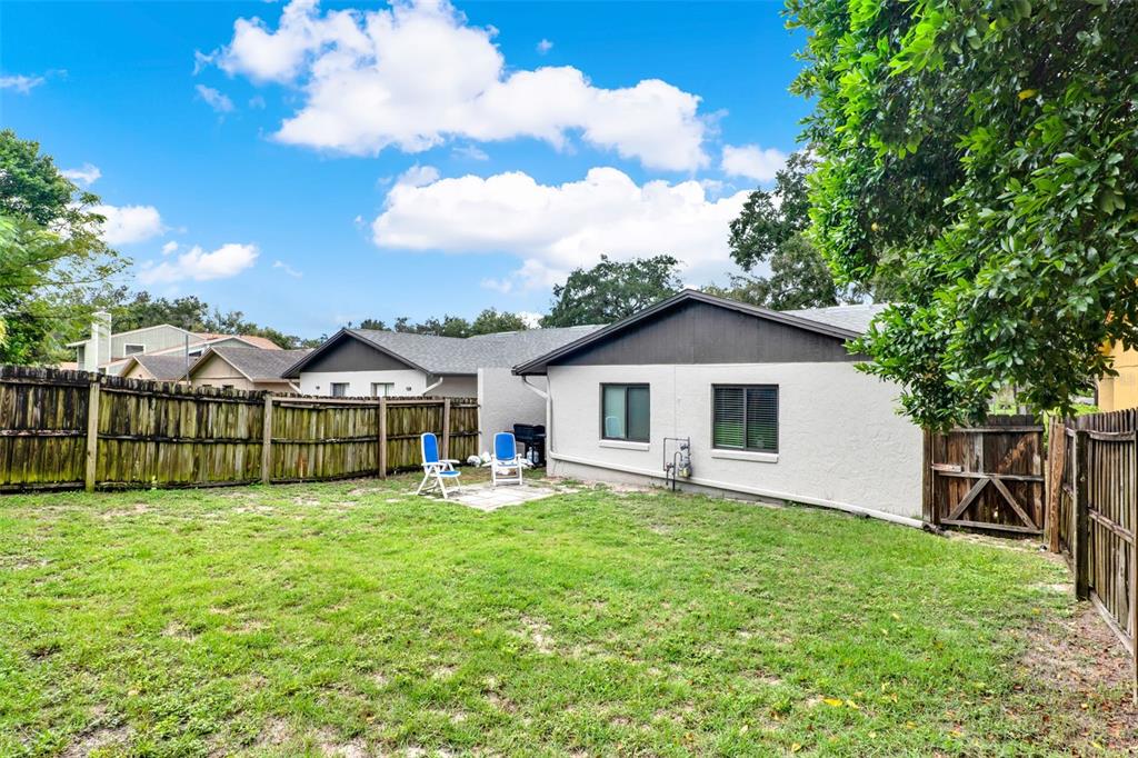 212 Perth Court Winter Springs, FL 32708 - Photo 27 of 57 a view of a house with a yard and sitting area