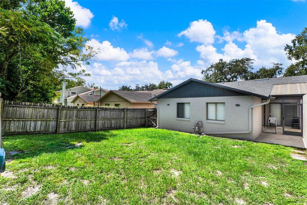 212 Perth Court Winter Springs, FL 32708 - Photo 31 of 57 a view of a house with a yard and pathway