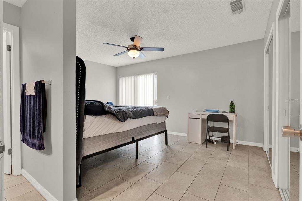 212 Perth Court Winter Springs, FL 32708 - Photo 52 of 57 a view of a livingroom with furniture and a window
