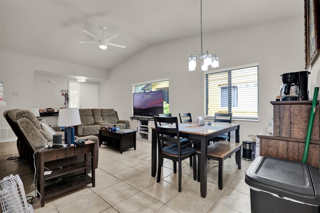 212 Perth Court Winter Springs, FL 32708 - Photo 6 of 57 a view of a dining room with furniture