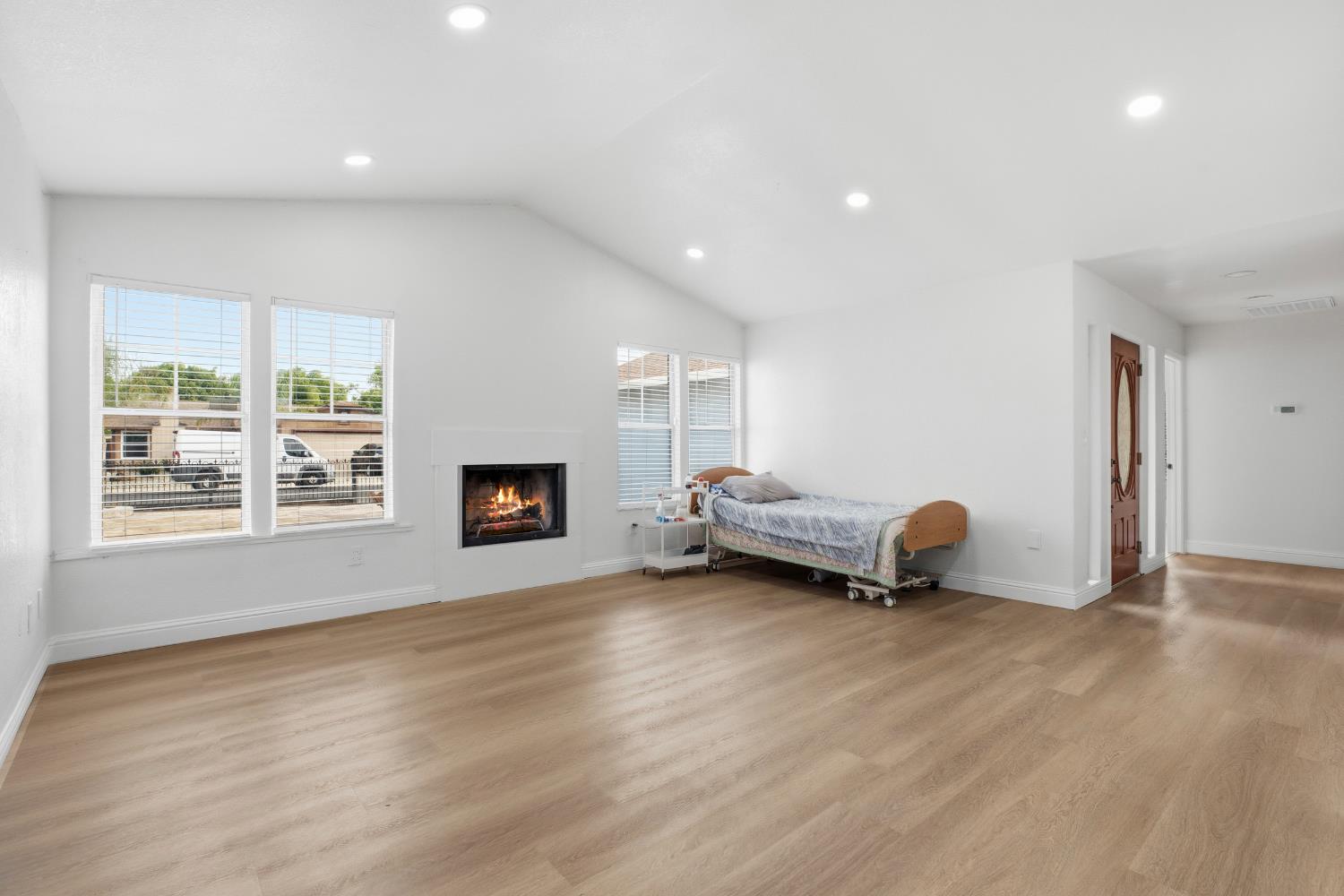 3020 Trudi Way Modesto, CA 95354 - Photo 10 of 24 a view of livingroom and a window with wooden floor