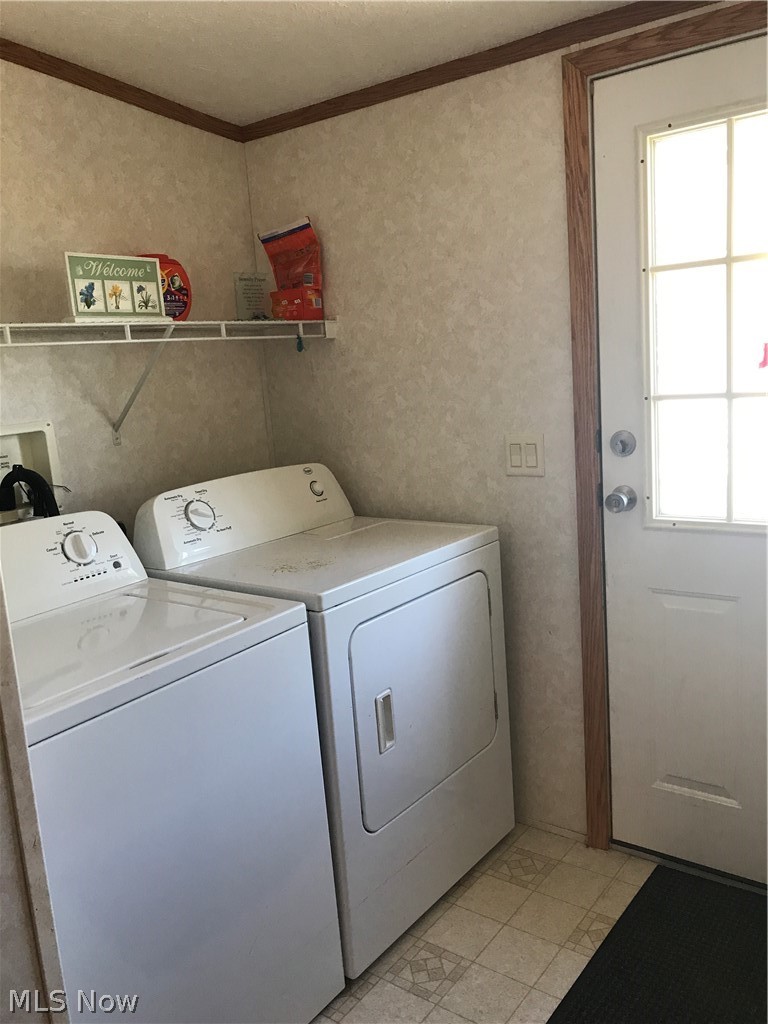 8868 Nichols Road Windham, OH 44288 - Photo 21 of 22 Laundry room with man door to a ramp- convenient,