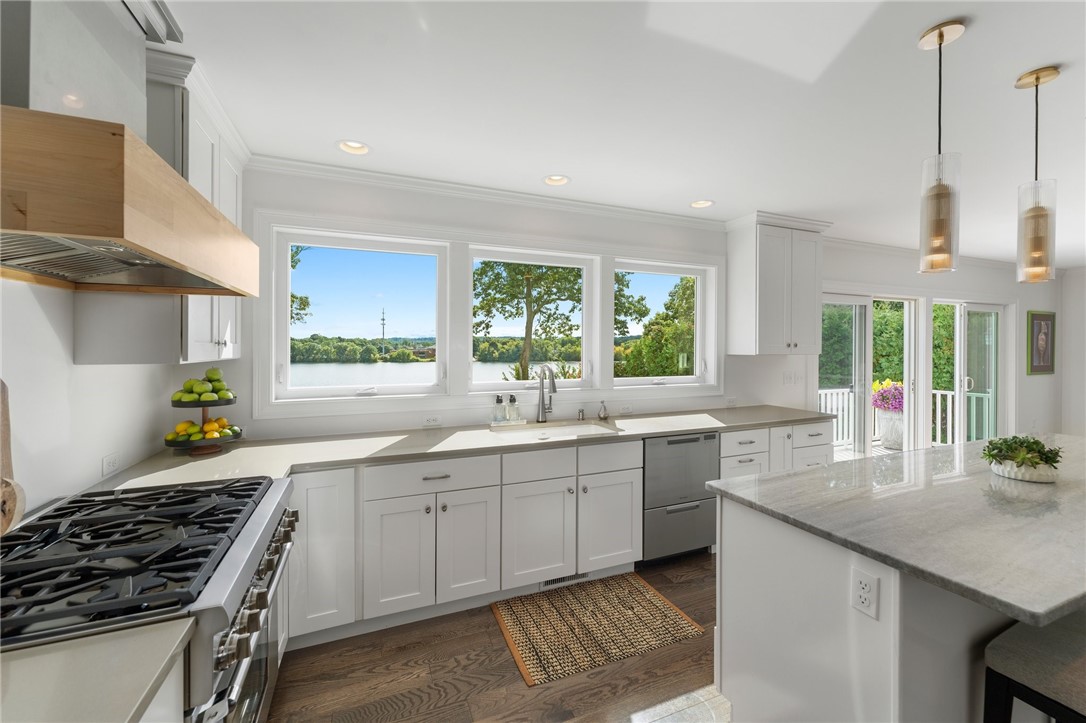 297 Gorton Lake Boulevard Warwick, RI 02886 - Photo 12 of 38 Thermador stove with custom hood and water view!