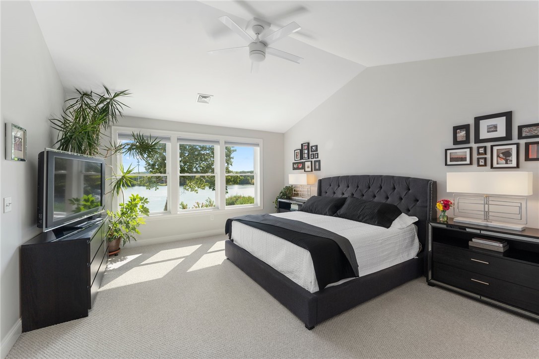 297 Gorton Lake Boulevard Warwick, RI 02886 - Photo 18 of 38 Relax in the spa like main bedroom suite with grand water views