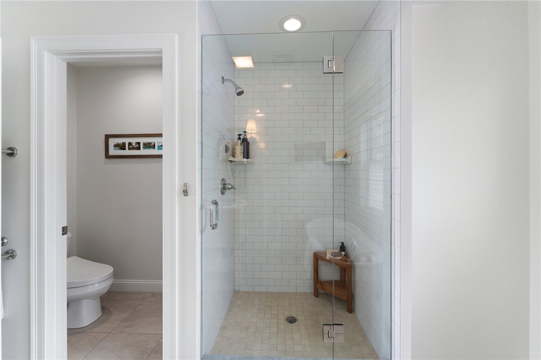 297 Gorton Lake Boulevard Warwick, RI 02886 - Photo 21 of 38 Spacious tile shower with water closet